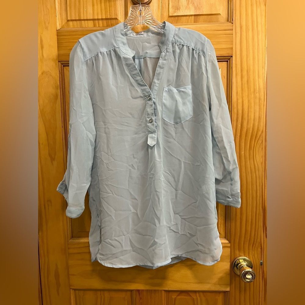 Like new Charming Charlie size medium powder blue rhinestone embellished blouse